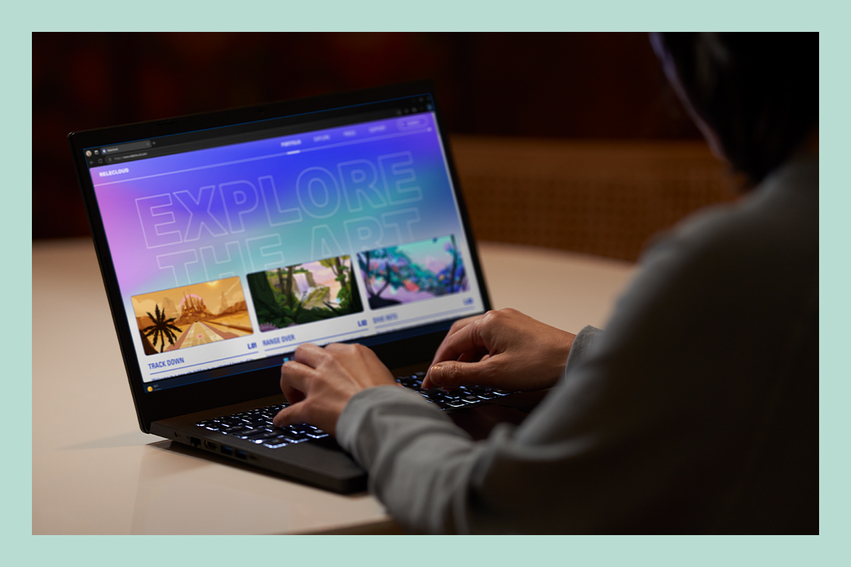 A man is playing games on a PCSpecialist laptop with Windows 11